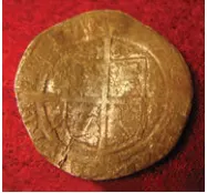 On the left a genuine coin, on the right a poor forgery.